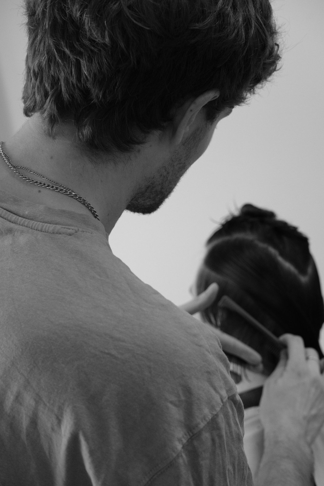 Barber at work, from behind